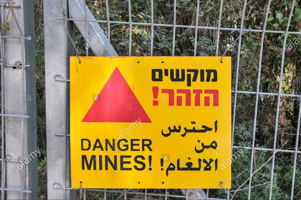 israel-a-mine-field-a-yellow-warning-sign-in-hebrew-arabic-and-english-danger-mines!-PYN9ME.jpg